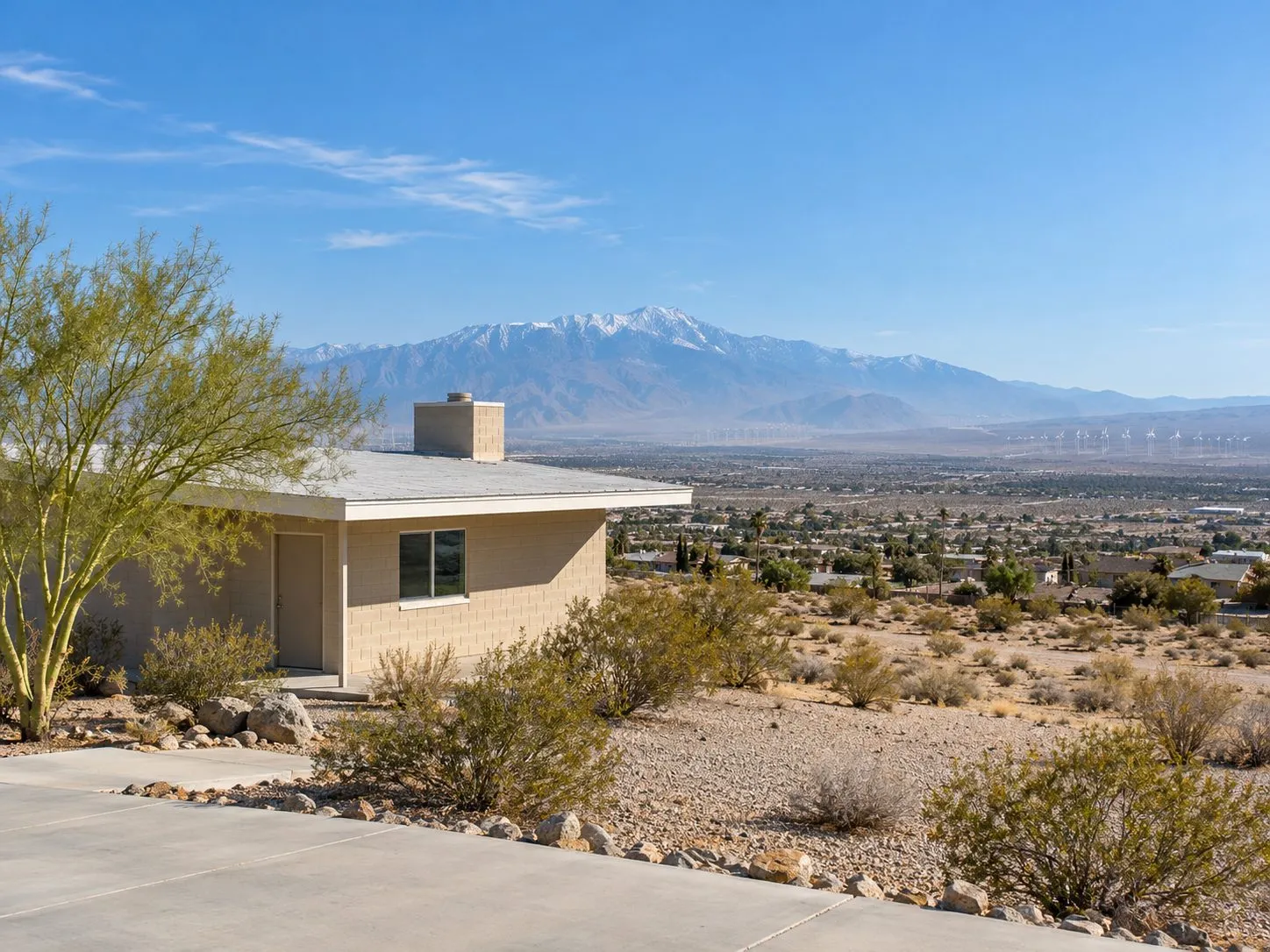Property illustration: a modest desert home looking across the valley to Mount San Jacinto from Desert Hot Springs