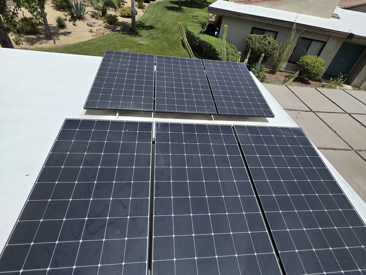 Job photo: freshly cleaned solar panels on a Palm Springs flat roof