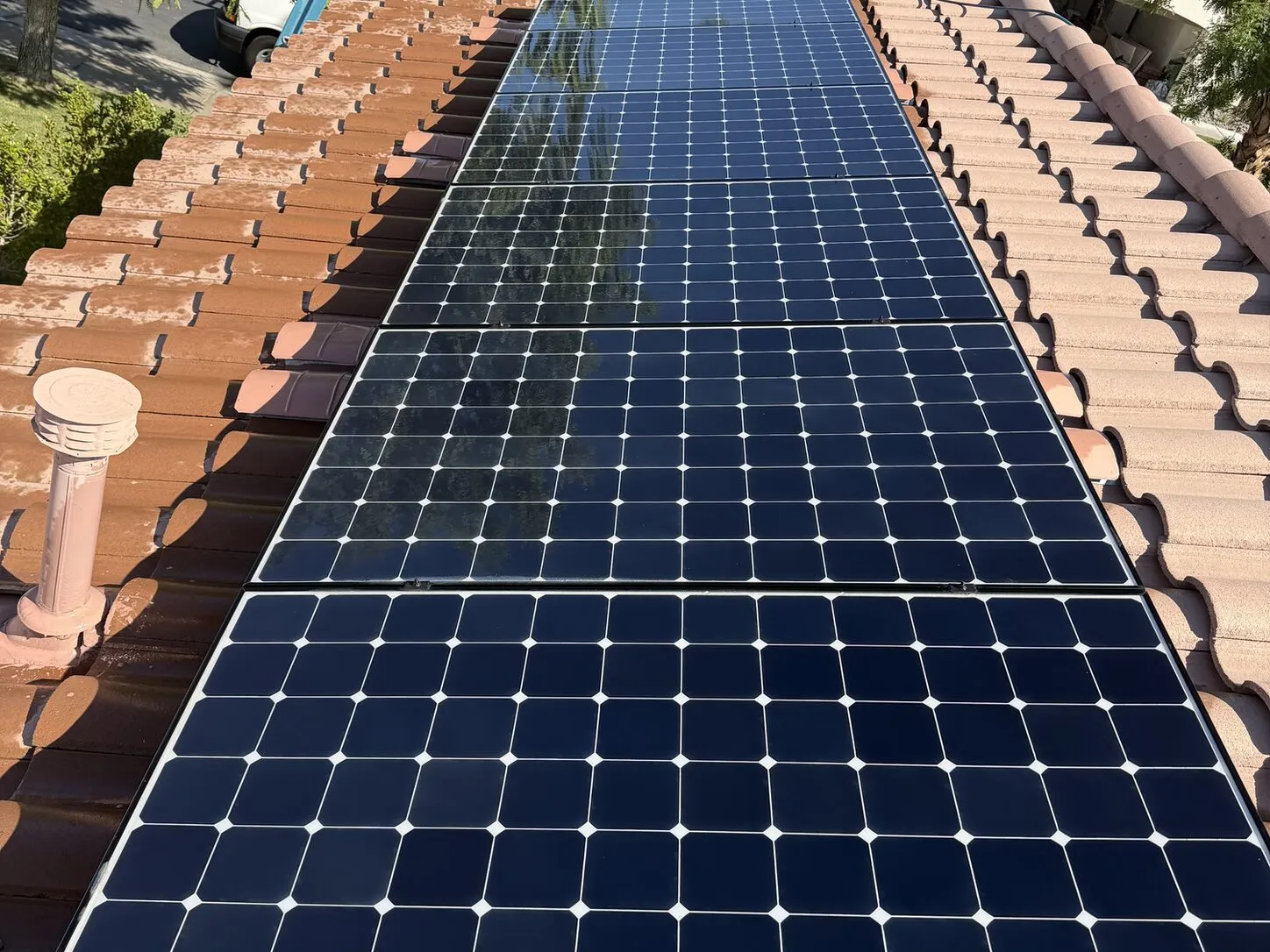 Job photo: freshly cleaned solar panels on a La Quinta clay-tile roof