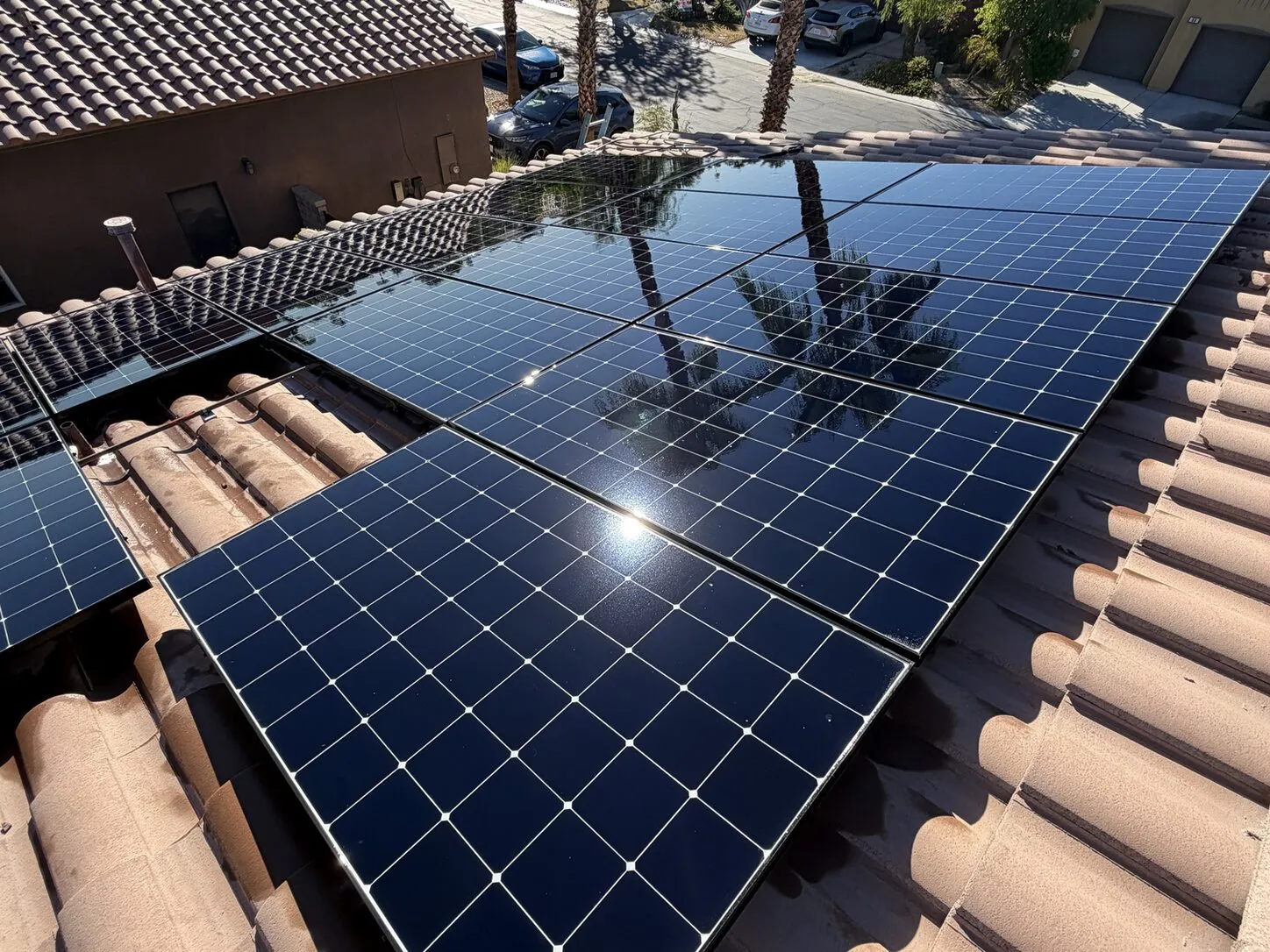 Job photo: a freshly cleaned solar array on a Rancho Mirage tile roof