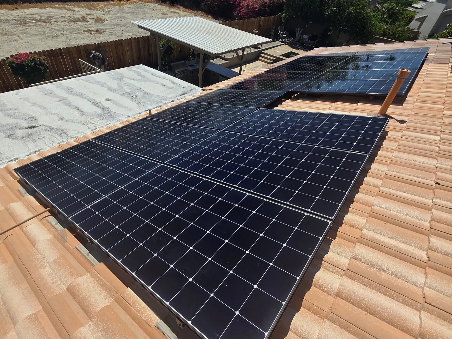 Job photo: a freshly cleaned solar array on a Palm Desert tile roof