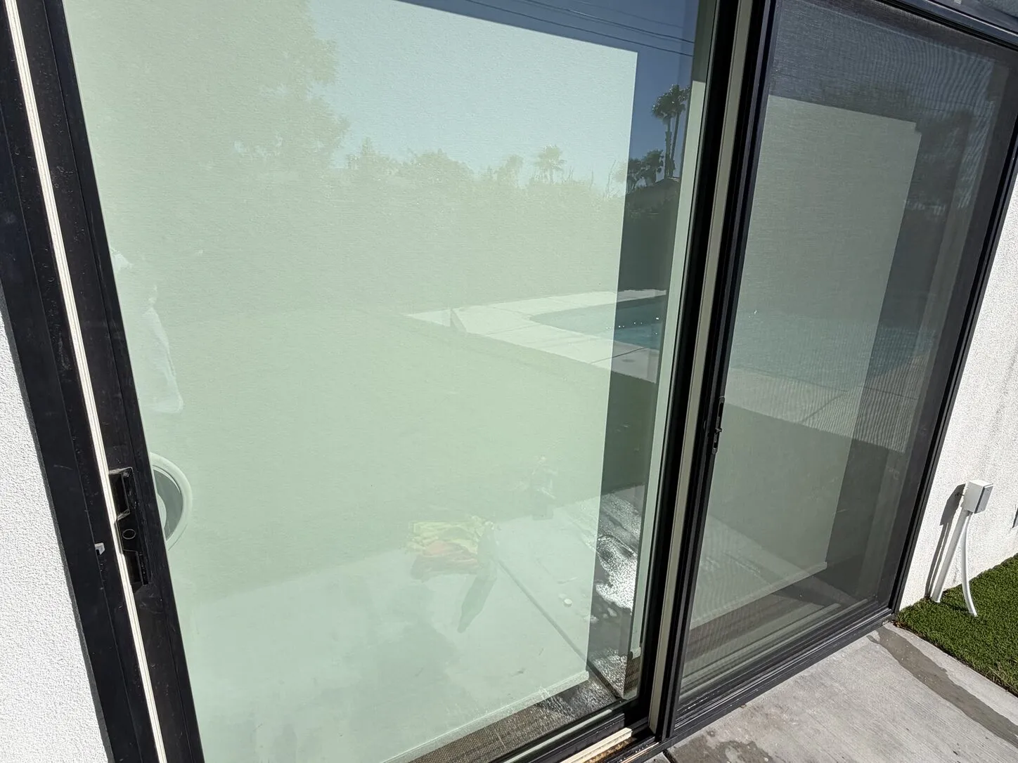 Job photo: a clean sliding glass door at a modern Palm Springs home